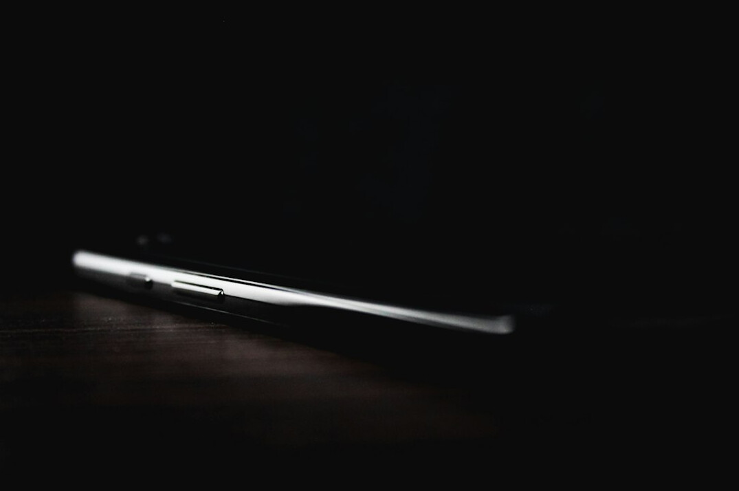 Close up of programming code on a dark laptop screen